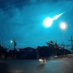 glowing meteorite on night sky