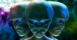three alien heads in space