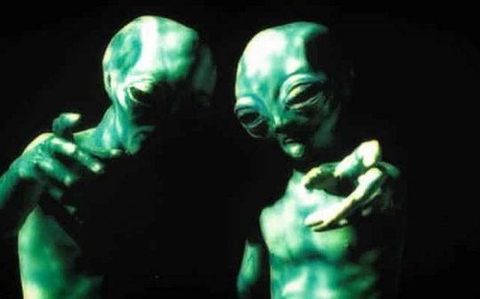 green aliens talking