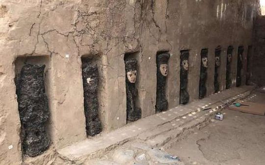 750-Year-Old Wooden Mask Wearing Idols Unearthed in Peru